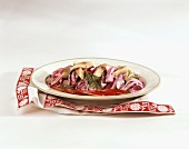 Rossolje (herring salad with meat and beetroot, Estonia)