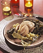 Quail, cooked in vine leaves, with green grapes
