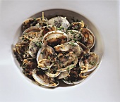 Shellfish in garlic butter with onions