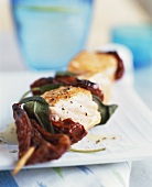Salmon kebab with sage and dried tomatoes