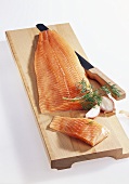 Salmon fillet on chopping board