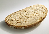Slices of light-coloured wheat and rye bread