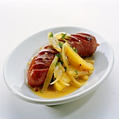 Sausage with onions and potatoes