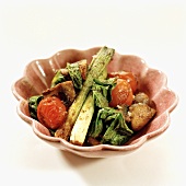 Warm leek salad with tomatoes and mushrooms