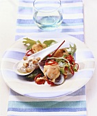 Fried mussels with walnut yoghurt and salad