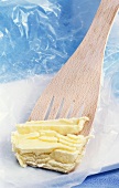Clarified butter on a spatula