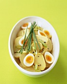 Potato salad with eggs and chives