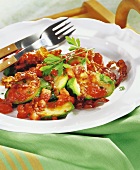 Courgettes with bacon and tomato sauce