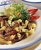Pasta with beef fillet and herb butter