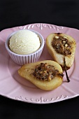 Poached pears with nut stuffing and vanilla ice cream