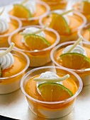 Orange mousse with orange jelly and cream