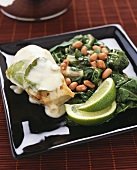 Chicken breast with coconut milk, chard and peanuts