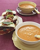 Tomato soup & bread topped with spinach, cheese, bresaola & figs