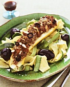 Ribbon pasta with almond-stuffed courgette & olives (Italy)