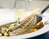 Grilled sole with courgettes and tomatoes