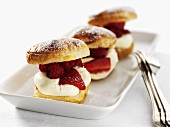 Scones filled with strawberries and vanilla cream