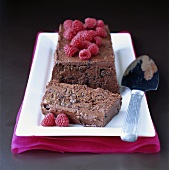 Chocolate mousse cake with rum, raisins and raspberries