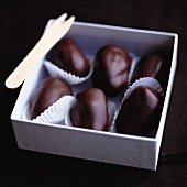 Chocolate-covered dates in box