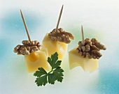 Cheese and walnuts on cocktail sticks