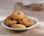 Apple fritters with icing sugar