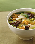 Chicken soup with vegetables and morels