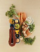 Still life with vegetables, mushrooms, sausage, eggs & herbs