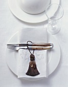 Rustic place-setting with embroidered napkin