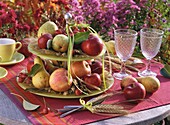 Late summer table decoration with apples, pears & cereal ears