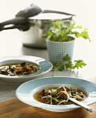 Beef soup with vegetables cooked in pressure cooker