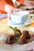 Chocolate truffles with mint and marigold petals
