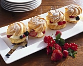Profiteroles filled with Bavarian cream and berries