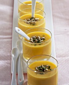 Carrot cream soup with soya milk and sunflower seeds