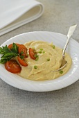 Hummus with tomatoes and parsley