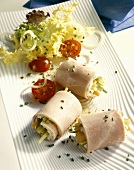 Ham rolls filled with soft cheese and vegetables
