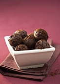 Whisky and coffee truffles in small dish