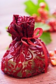 Small bag of soap to give as a gift, guelder rose berries