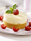 Small cheesecake with raspberries