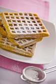 Waffles sprinkled with icing sugar