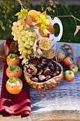 Sweet chestnuts, grapes, persimmons, apples & autumn leaves
