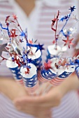 Woman holding sparklers (4th of July, USA)