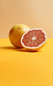 Pink grapefruit, whole and half
