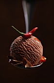 A scoop of chilli chocolate ice cream on spoon