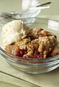 Cranberry crumble with vanilla ice cream