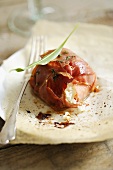 Roasted goat's cheese wrapped in raw ham
