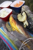 Oven-baked corn on the cob with dips