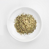 Rosemary, chopped and dried, in white dish