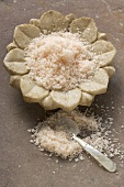 Bath salts in flower-shaped dish, mother-of-pearl spoon