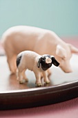 Two toy pigs
