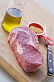 Beef steak, spice mixture and olive oil