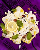 Fennel and pear carpaccio with hazelnuts and basil